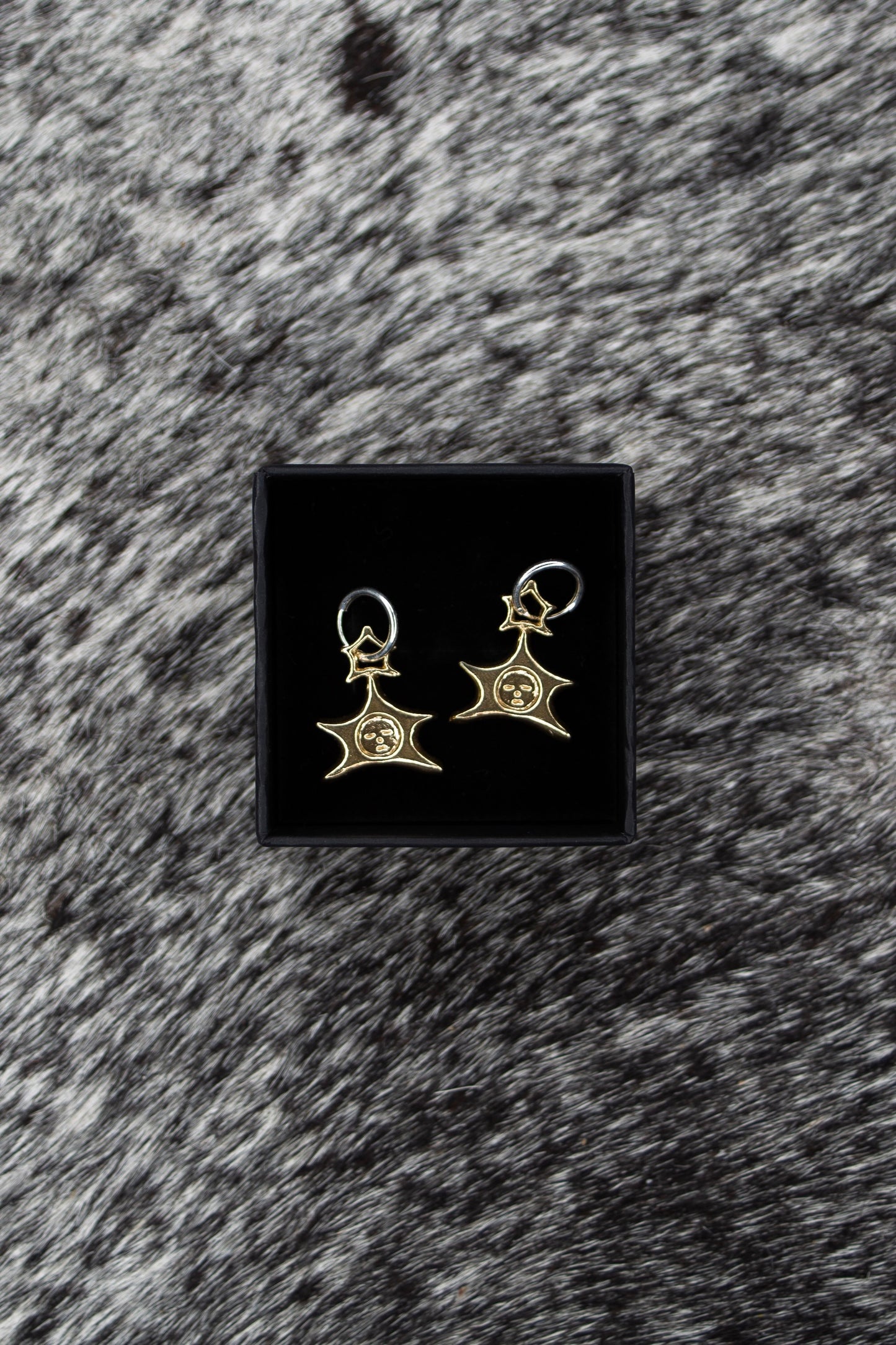 GOLD TONE STAR BABY EARRINGS