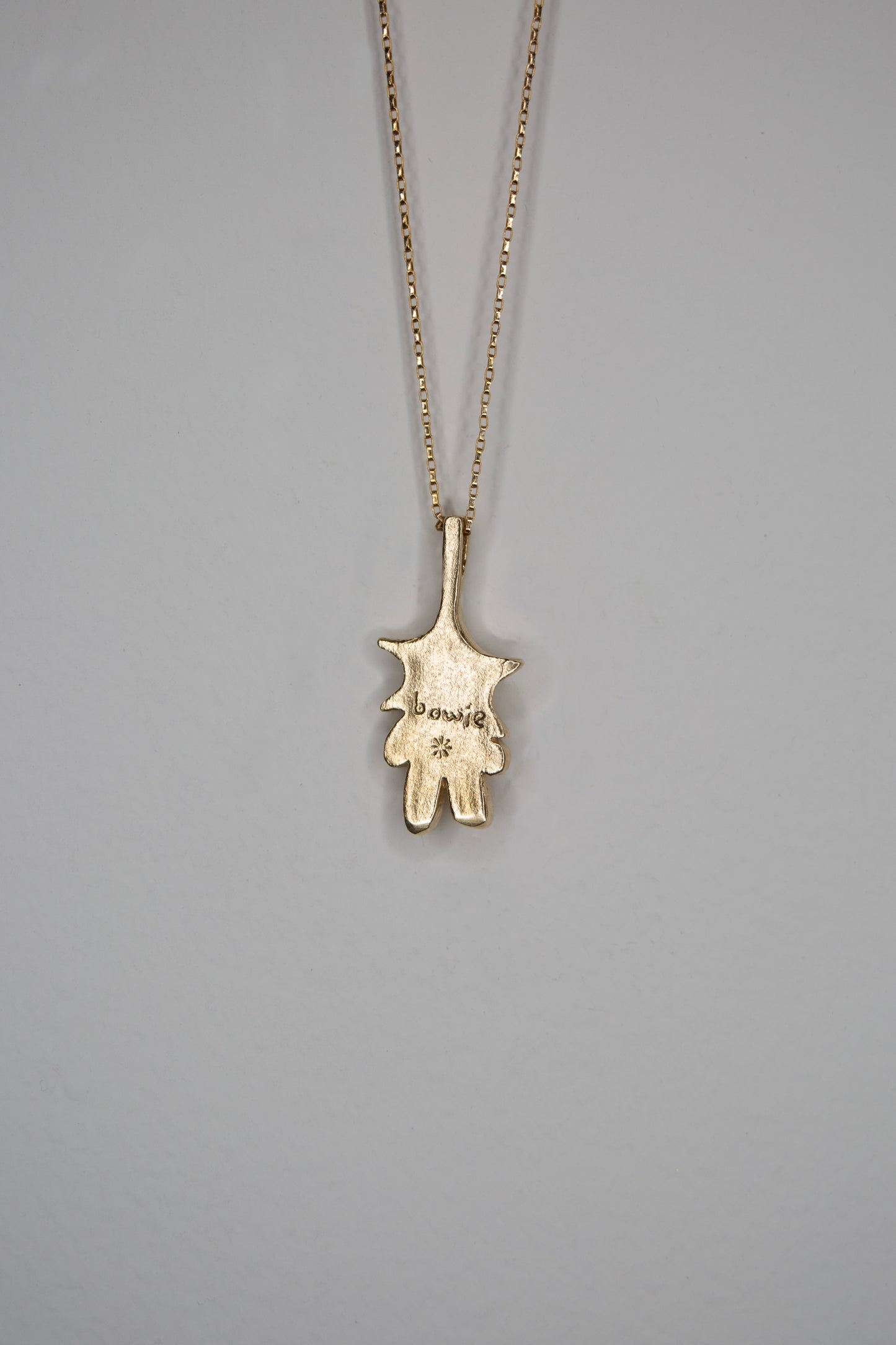 GOLD TONE HOLLOW HEART STAR BABY